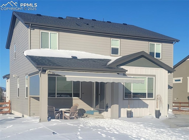 view of snow covered property