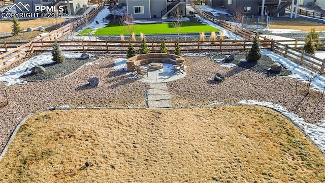 view of yard featuring a fire pit and a patio area