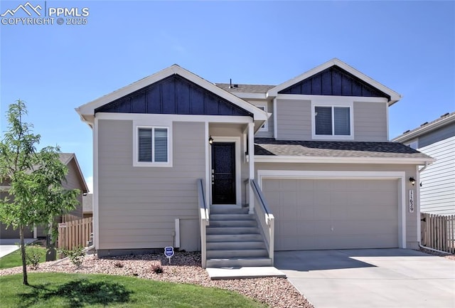 view of front facade with a garage and a front yard