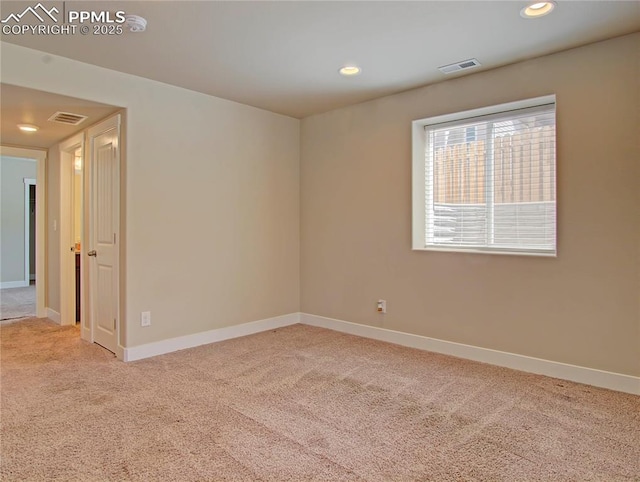 unfurnished room with carpet flooring