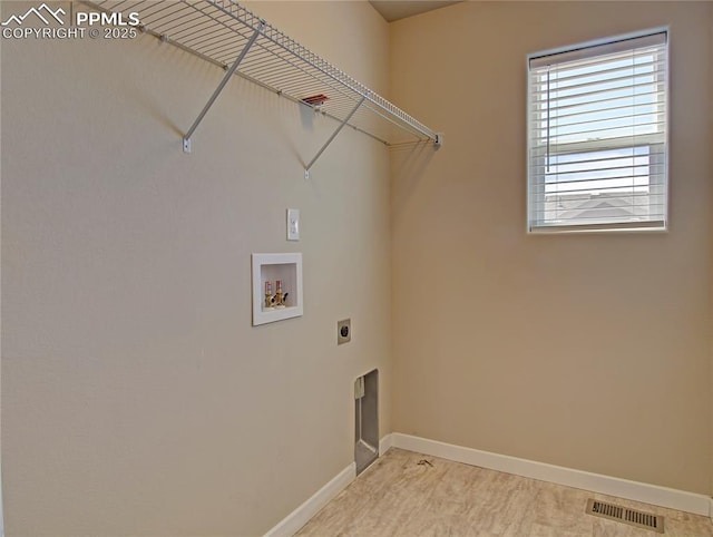 washroom with hookup for a washing machine and electric dryer hookup