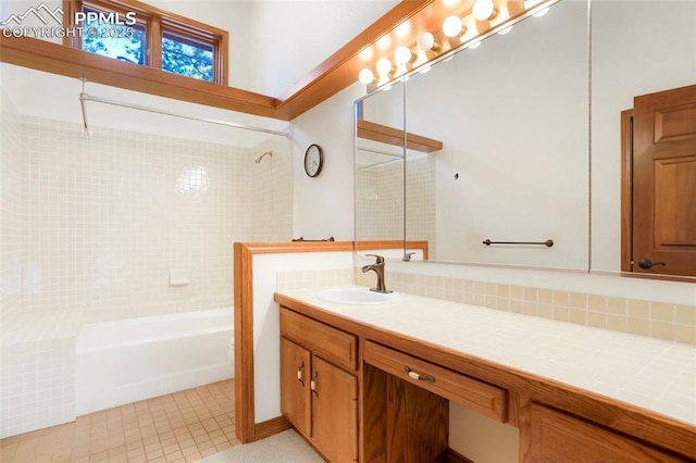 full bathroom with vanity, tile patterned floors,  shower combination, and toilet