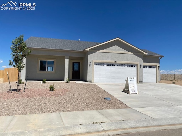 single story home with a garage