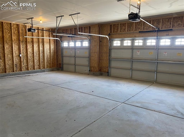 garage featuring a garage door opener