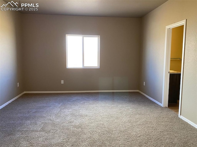 view of carpeted spare room