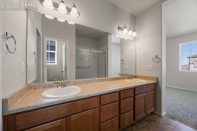 bathroom featuring vanity, tile patterned floors, and walk in shower