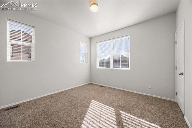 view of carpeted spare room