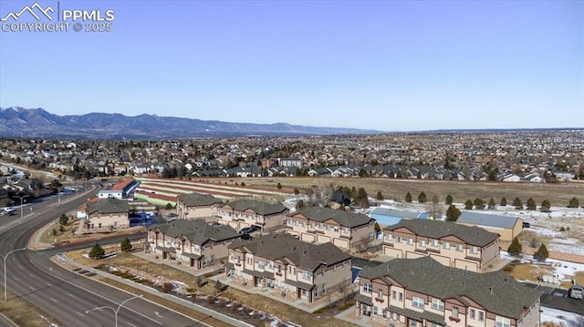 drone / aerial view featuring a mountain view