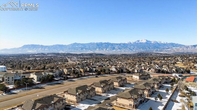 bird's eye view with a mountain view