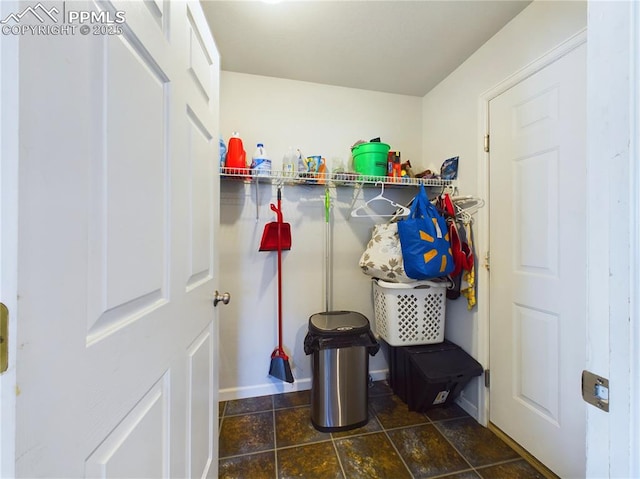 mudroom with stone finish flooring