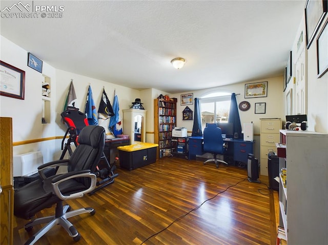 office with dark wood-style flooring