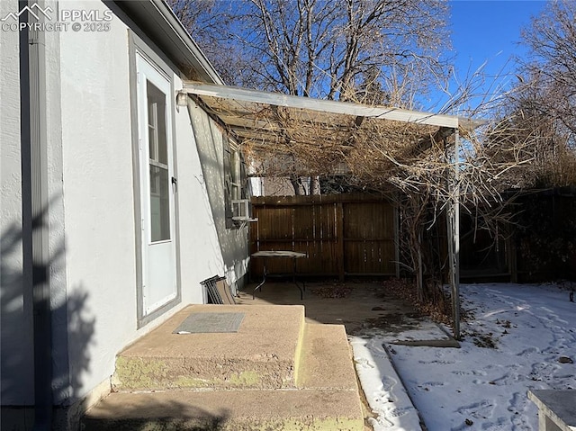 view of side of home with a patio