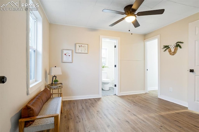 interior space featuring ceiling fan and hardwood / wood-style floors