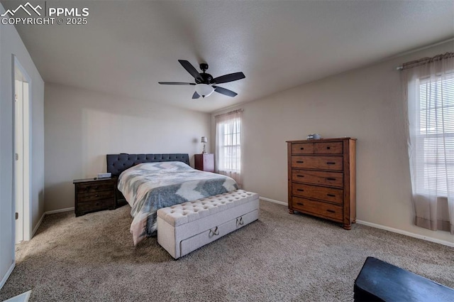 bedroom featuring ceiling fan and carpet flooring