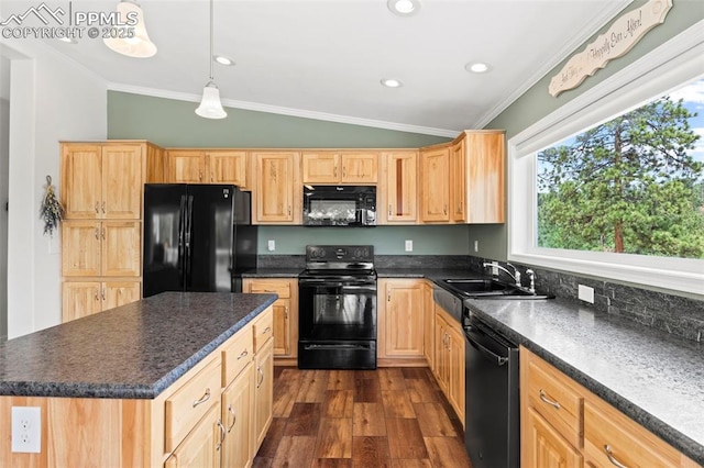 kitchen featuring ornamental molding, sink, a kitchen island, and black appliances