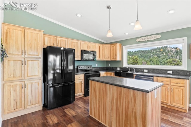 kitchen with sink, crown molding, a center island, black appliances, and decorative light fixtures