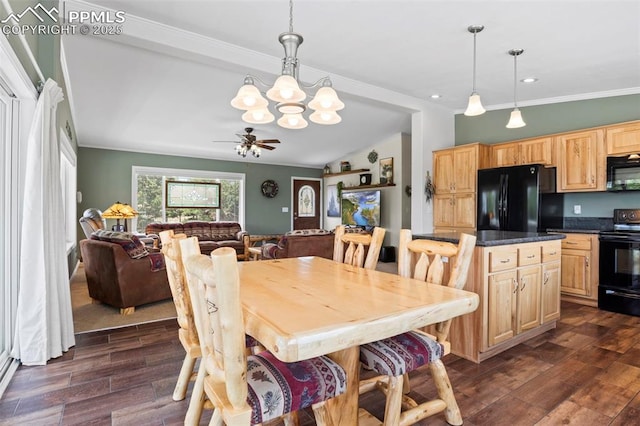 dining room featuring crown molding, dark hardwood / wood-style flooring, ceiling fan with notable chandelier, and vaulted ceiling