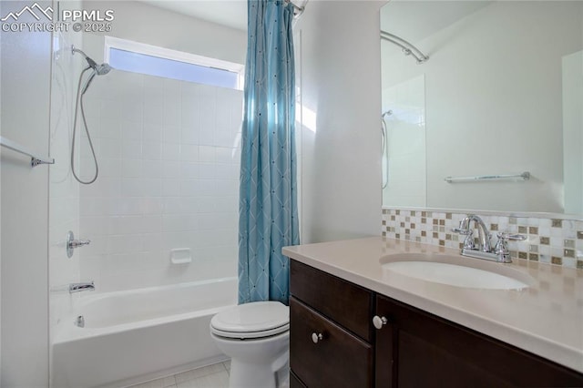 full bath featuring toilet, shower / tub combo, tasteful backsplash, and vanity