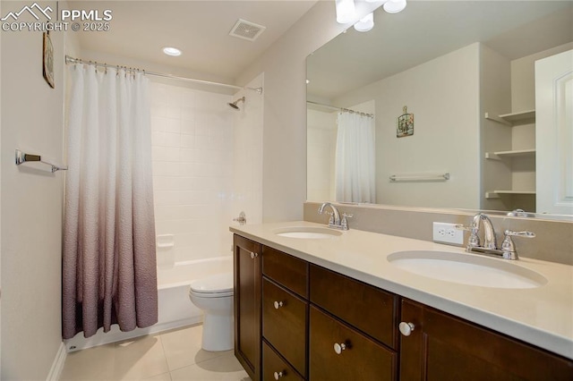 full bath featuring tile patterned flooring, visible vents, a sink, and double vanity