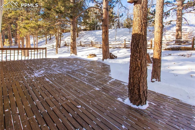 view of snow covered deck