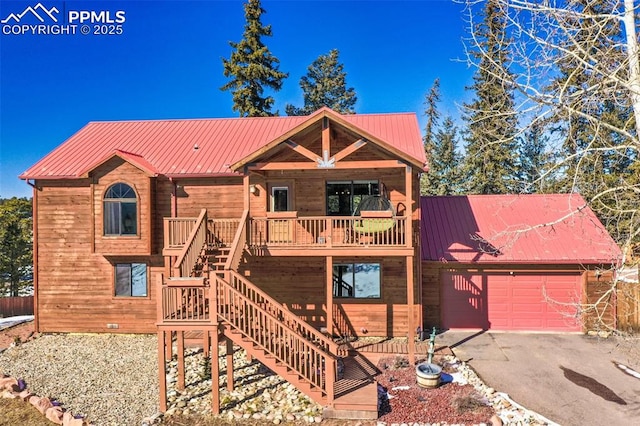 view of front of home with a garage and covered porch