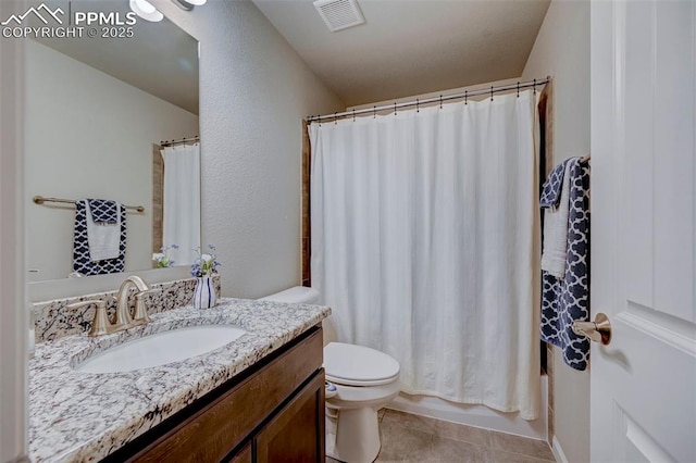 full bathroom featuring vanity, shower / bathtub combination with curtain, tile patterned floors, and toilet