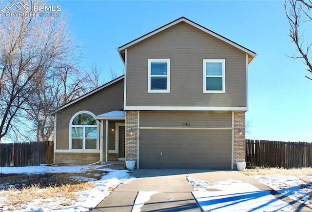 view of front of property featuring a garage