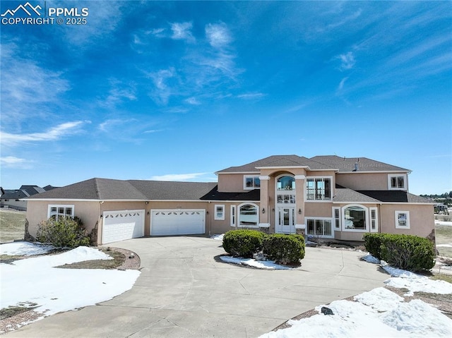 view of front of property featuring a garage