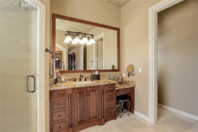 bathroom with vanity and walk in shower