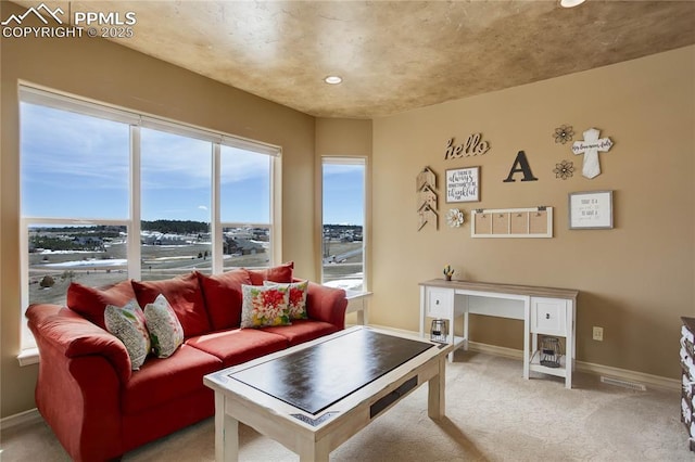 living room with light colored carpet