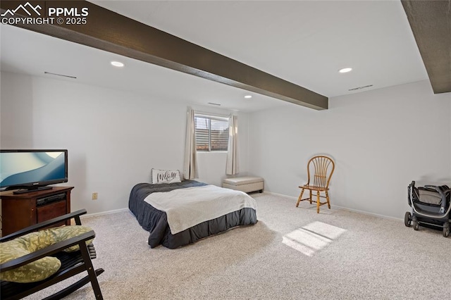 bedroom featuring carpet floors and beam ceiling