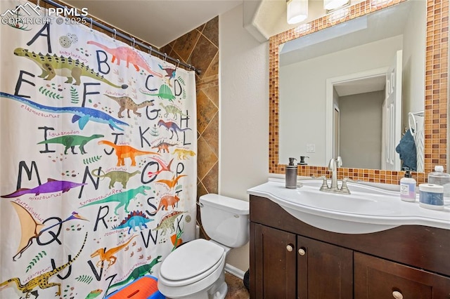 bathroom featuring vanity, a shower with curtain, and toilet