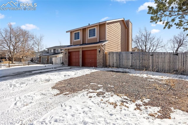 view of front of home with a garage