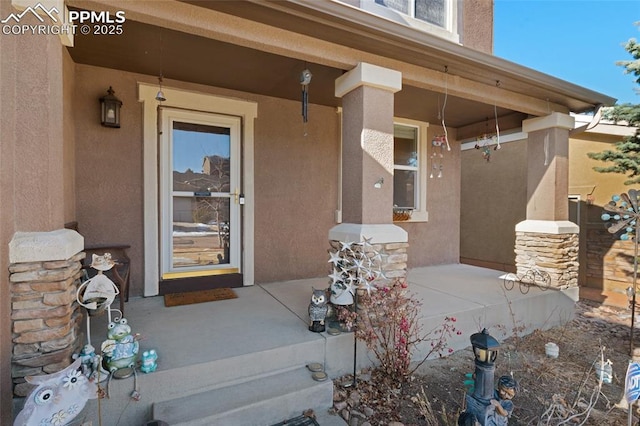 property entrance with covered porch