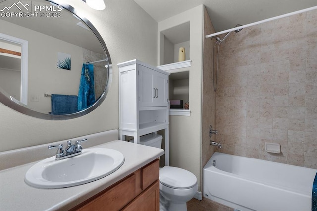 full bathroom with vanity, shower / bath combination with curtain, tile patterned floors, and toilet