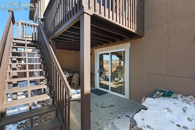 view of snow covered patio