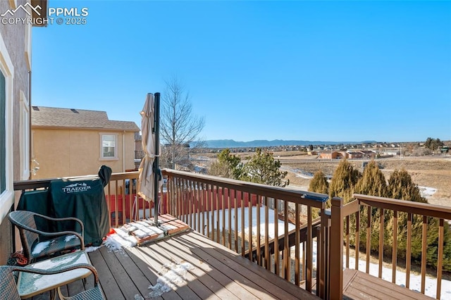 deck with a mountain view