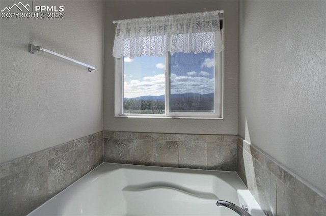 full bath with a bath