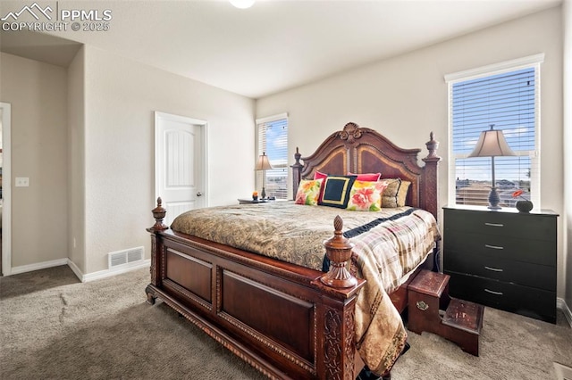 bedroom with light colored carpet