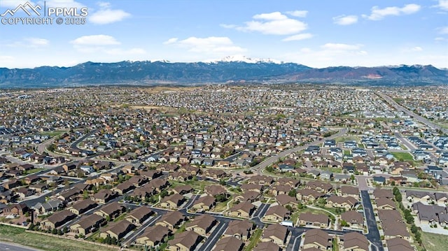 bird's eye view with a mountain view