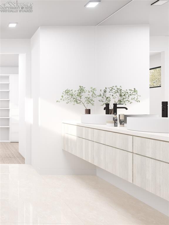 bathroom featuring vanity and tile patterned floors