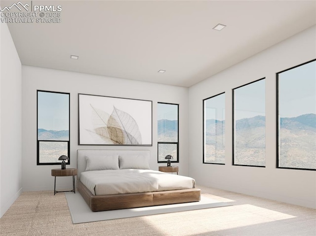 carpeted bedroom featuring a mountain view