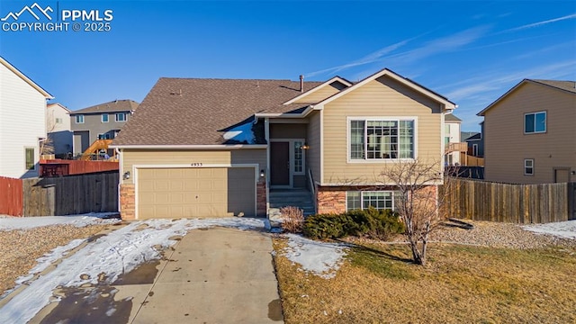 view of front of home with a garage