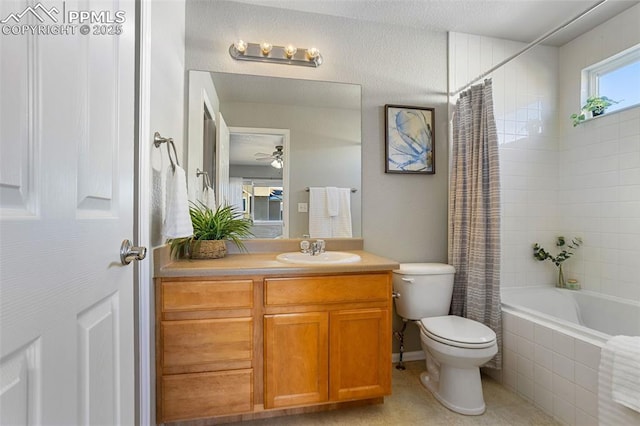 full bathroom featuring shower / bath combo, vanity, tile patterned floors, and toilet