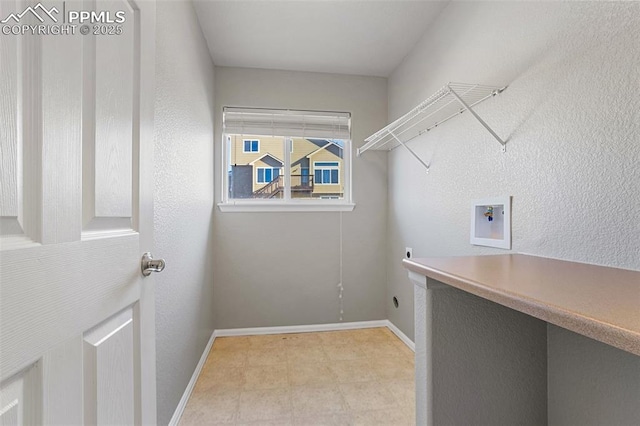 laundry area with hookup for a washing machine and electric dryer hookup