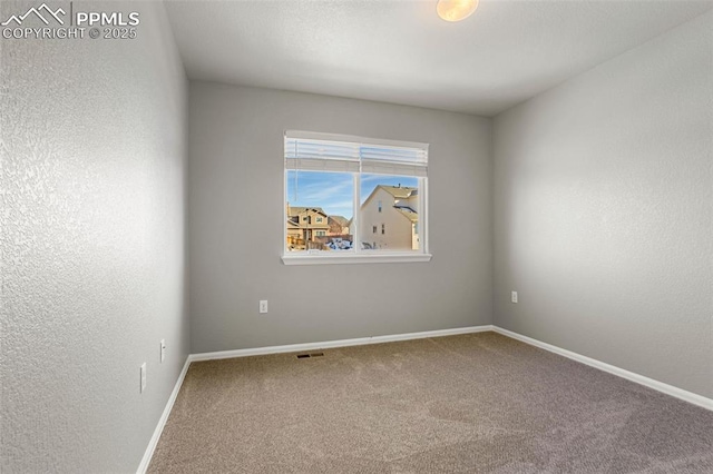 view of carpeted empty room