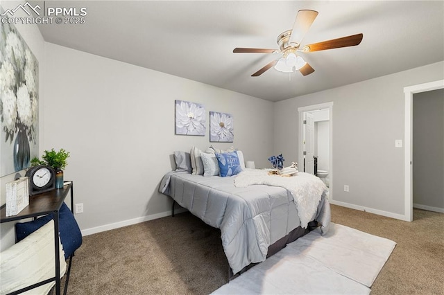 bedroom with ensuite bathroom, ceiling fan, and carpet flooring