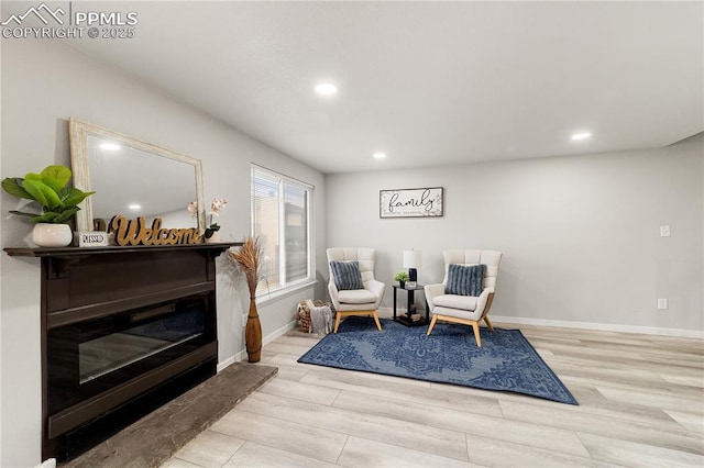 living area with light wood-type flooring