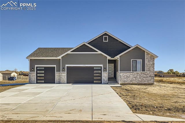 craftsman-style house featuring a garage