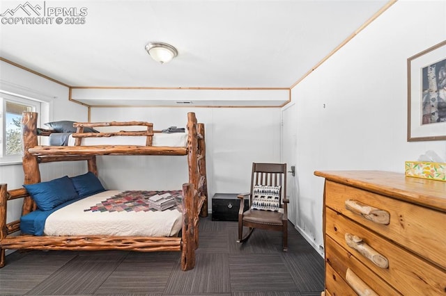 carpeted bedroom with crown molding